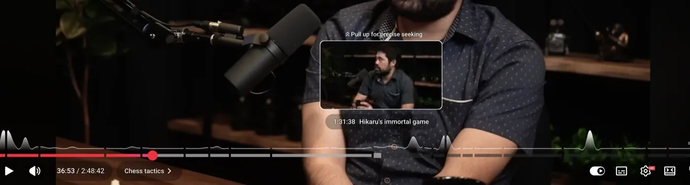 YouTube’s player showing chapter navigation and a preview at a selected timestamp
